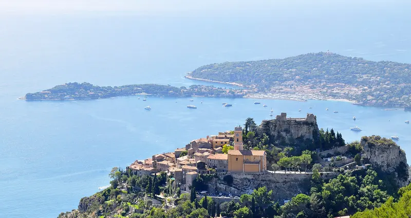 The village of Èze on its rock high above the sea, with Cap Ferrat beyond