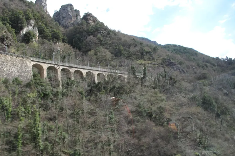 An arched railway viaduct on the mountain line up towards Tende