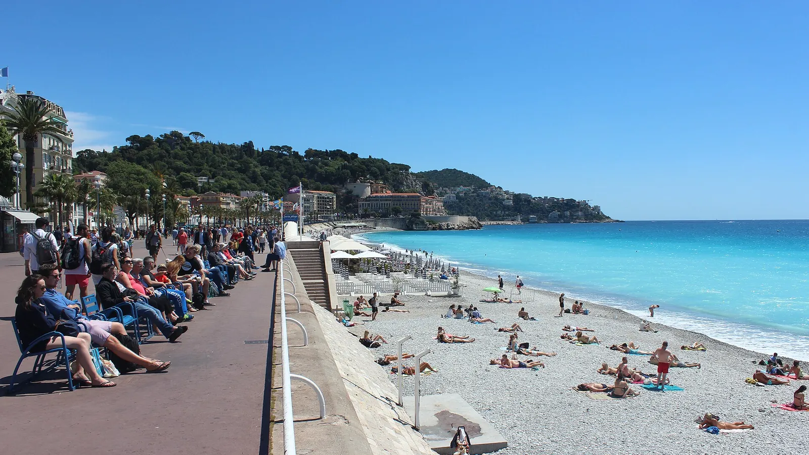 The curving seafront of the Promenade des Anglais along the Baie des Anges in Nice