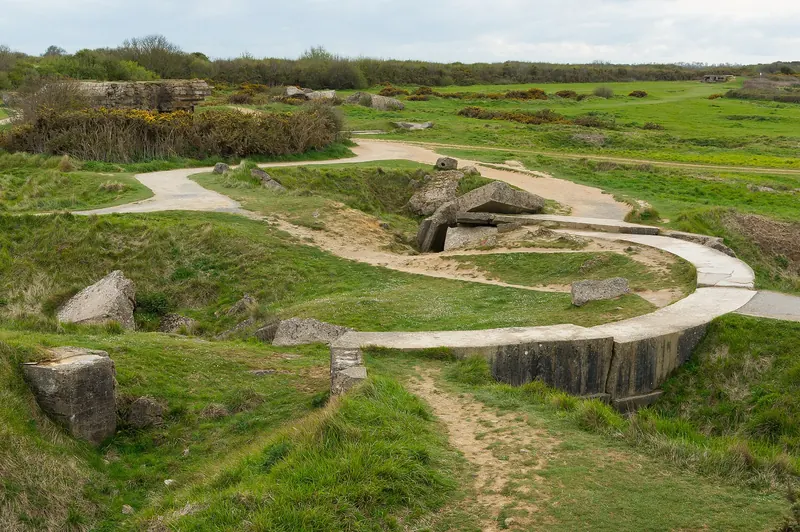 The cratered clifftop battlefield at Pointe du Hoc