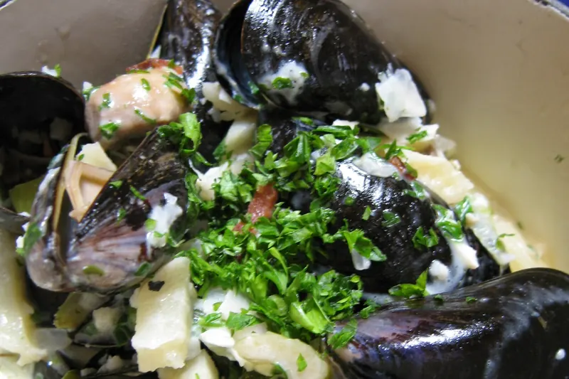 Mussels cooked Normandy-style in a creamy sauce