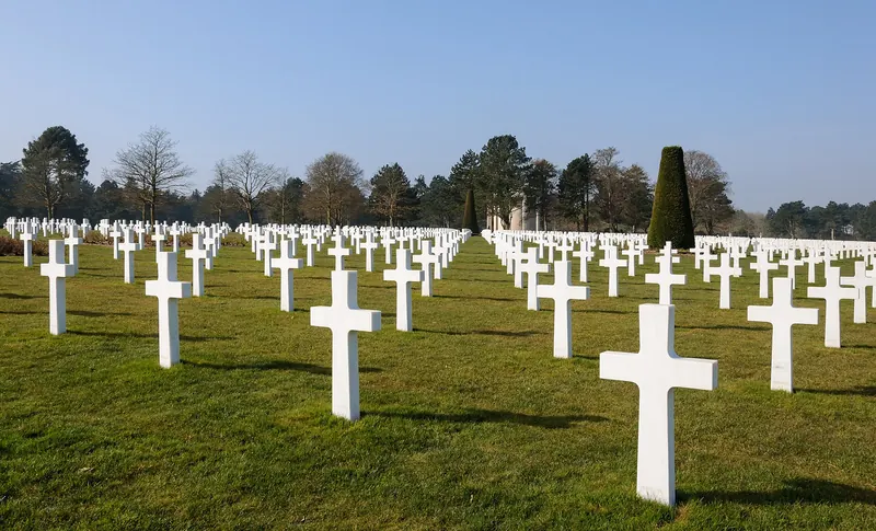 Rows of white marble crosses at the Normandy American Cemetery above Omaha Beach