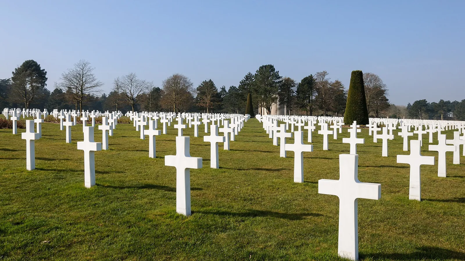 Rows of white marble crosses at the Normandy American Cemetery above Omaha Beach