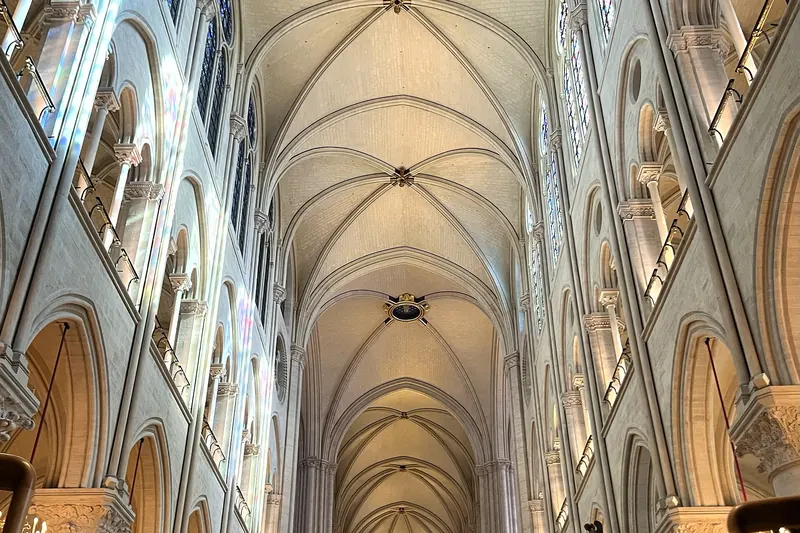 The restored, brightened nave of Notre-Dame de Paris in 2025
