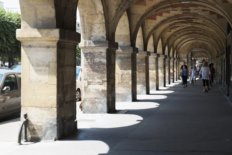 The arcaded Place des Vosges in the Marais