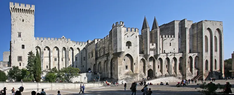 The vast facade of the Palais des Papes in Avignon