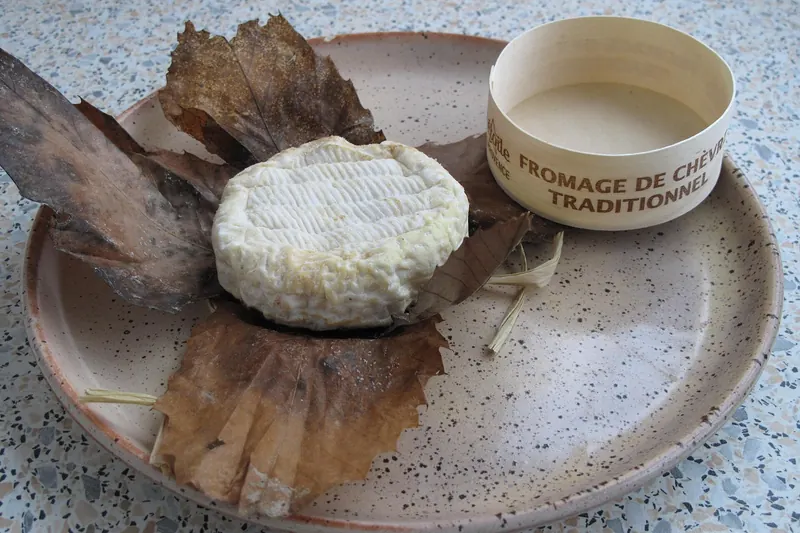 A Banon goat cheese wrapped in chestnut leaves and tied with raffia