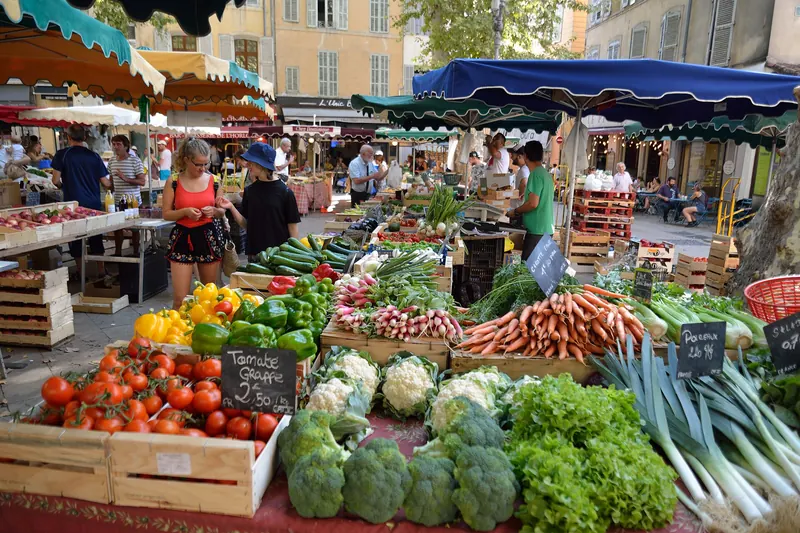 Fruit and vegetable stalls at a French weekly market