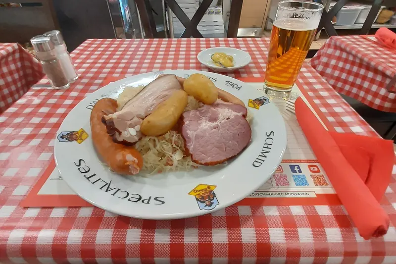 Choucroute garnie — sauerkraut with sausages and cured pork