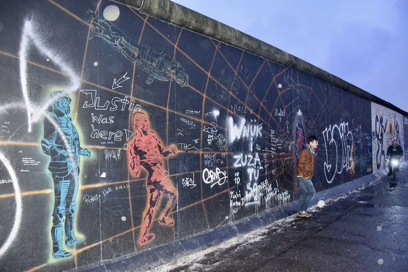 A painted section of the East Side Gallery, a surviving stretch of the Berlin Wall