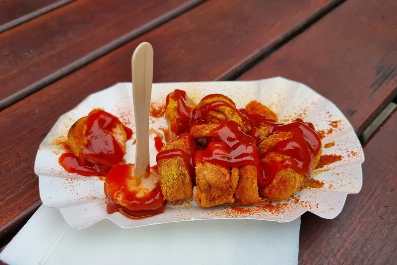 Currywurst, sliced sausage with curry-spiced ketchup, a Berlin invention