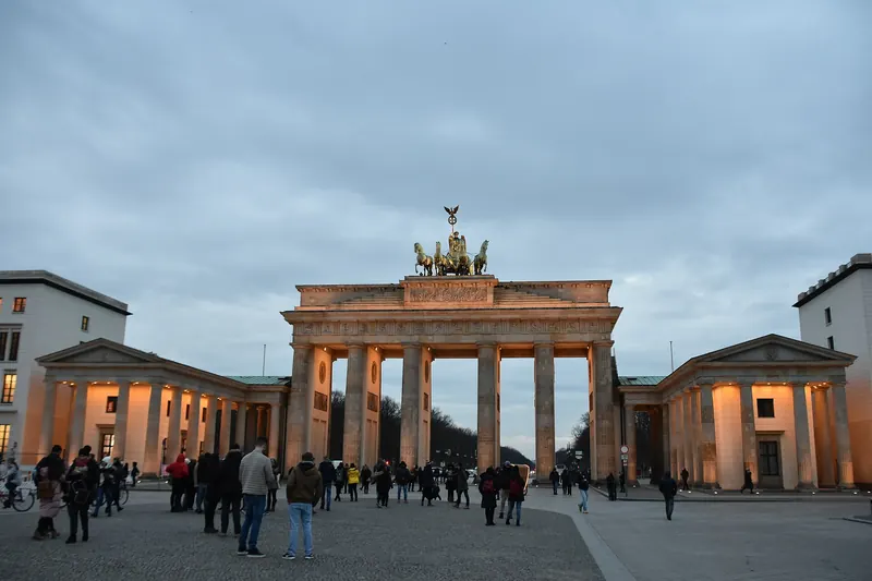 The Brandenburg Gate illuminated at dusk