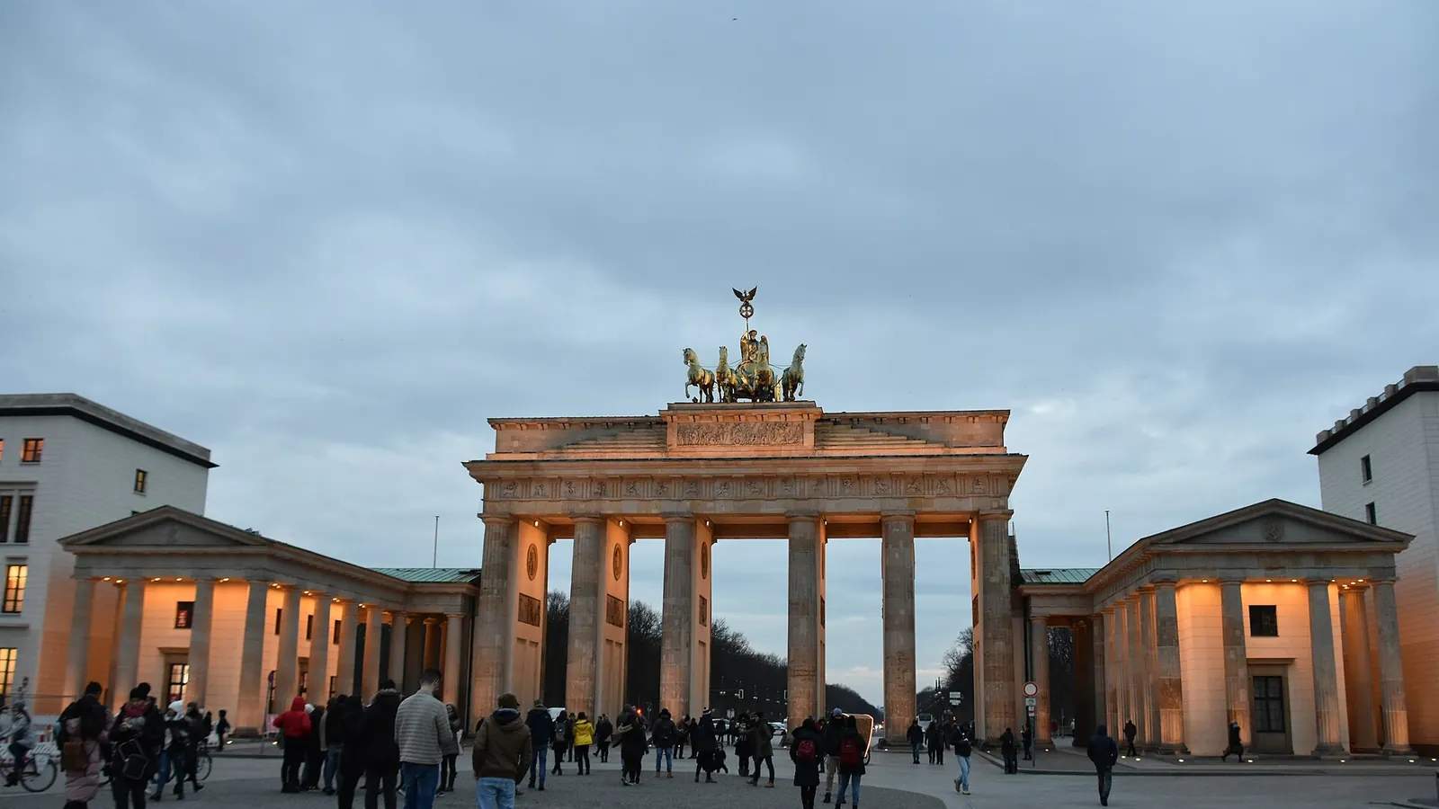 The Brandenburg Gate illuminated at dusk