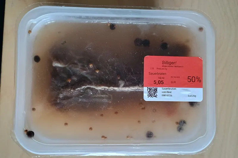A plate of Rheinischer Sauerbraten with gravy