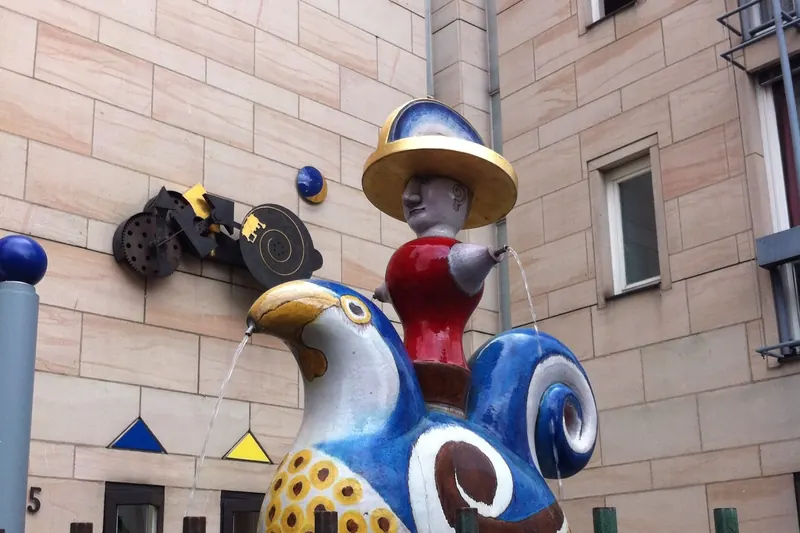 A figure outside the Nuremberg Toy Museum in the old town