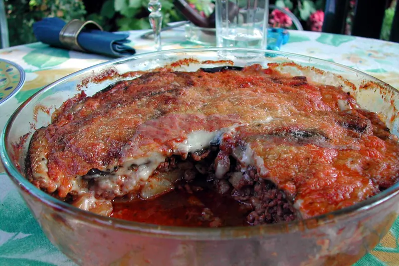 Moussaka, layered aubergine, spiced meat and béchamel