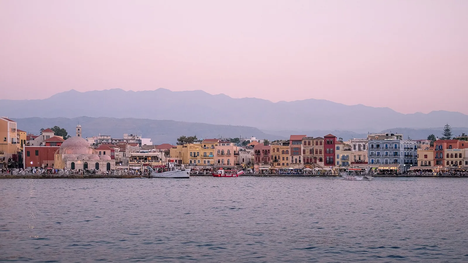 Chania's Venetian harbour at dusk on the island of Crete
