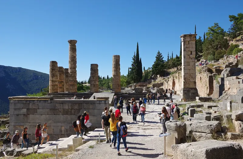 The ruins of the Temple of Apollo at Delphi on the mountainside
