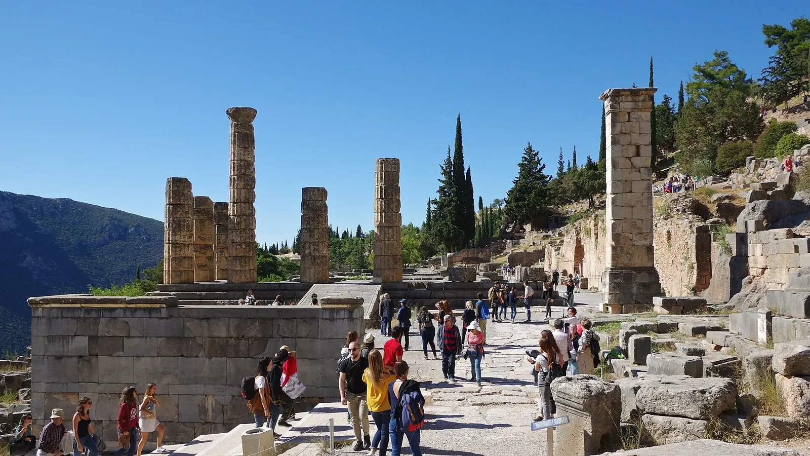 The ruins of the Temple of Apollo at Delphi on the mountainside