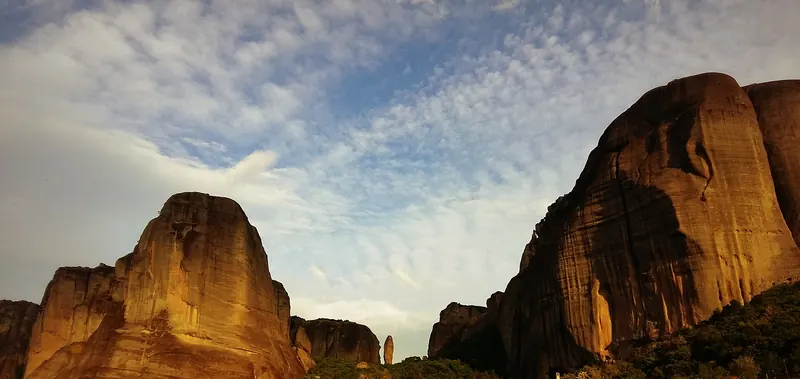 The rock pillars of Meteora seen from the base of the valley