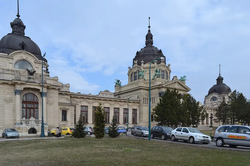 People bathing in the outdoor pools at Széchenyi Thermal Bath
