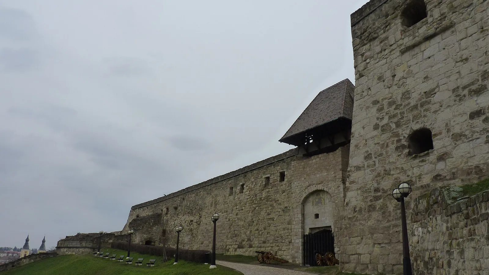 The walls of Eger Castle above the town