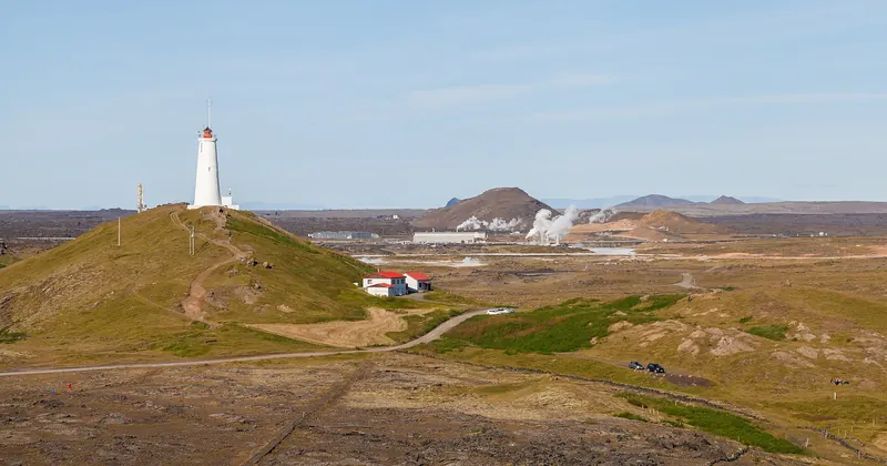 Dramatic sea cliffs and black sand at Valahnúkur near Reykjanesviti