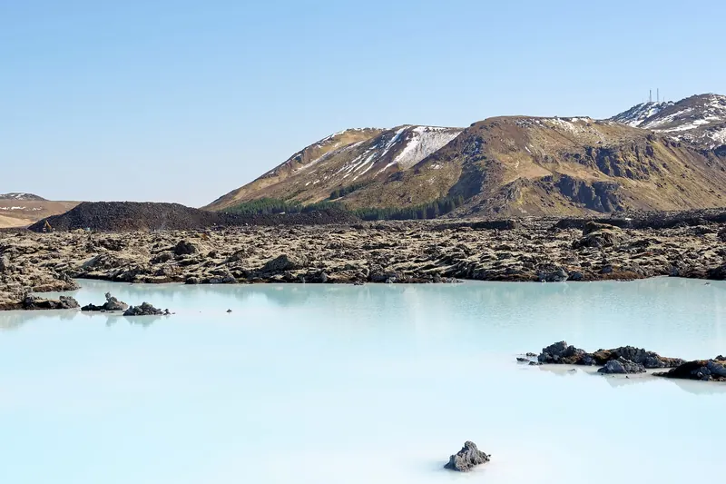 The Blue Lagoon's milky-blue geothermal water with Mount Þorbjörn behind it
