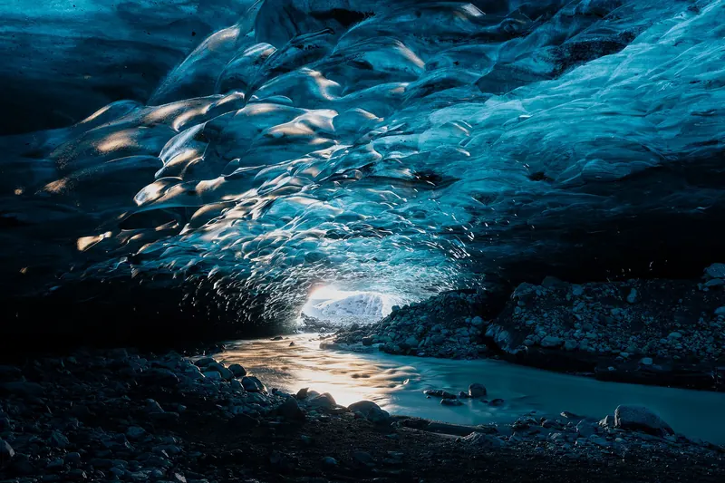 A blue ice cave inside Vatnajökull glacier