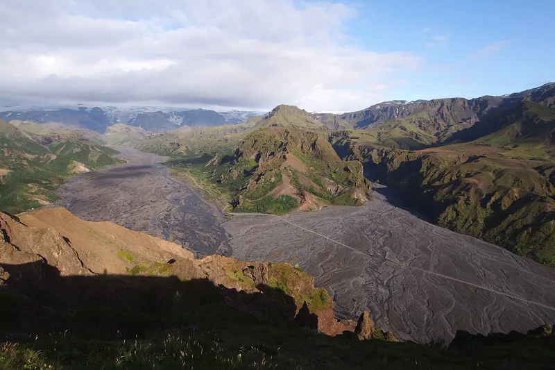 The green valley of Þórsmörk framed by glaciers