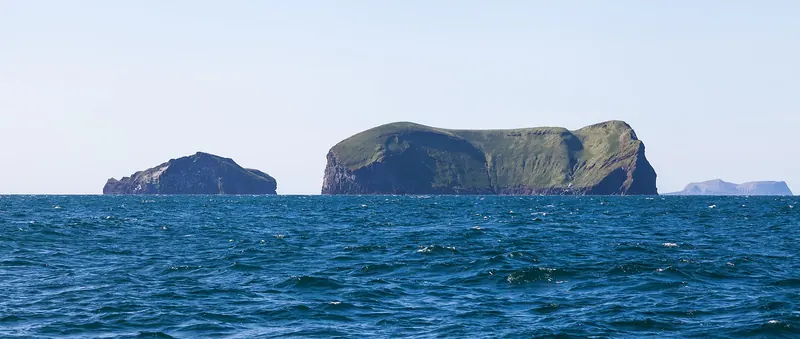 Dramatic sea stacks and islands near Surtsey in the Westman archipelago