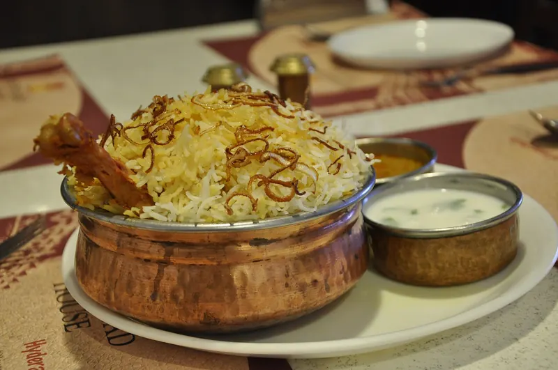 A plate of Hyderabadi chicken biryani with spiced rice