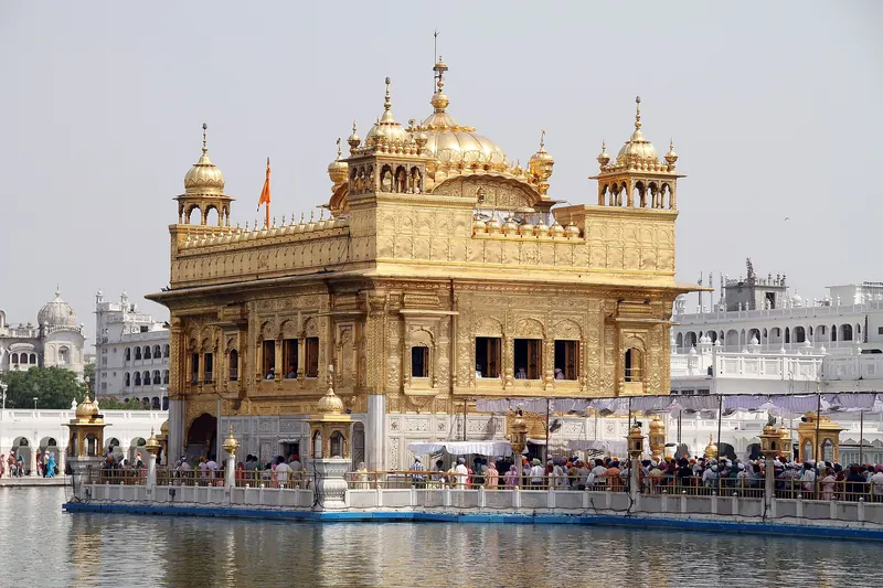 The gold-covered Harmandir Sahib temple reflected in the sacred pool at Amritsar