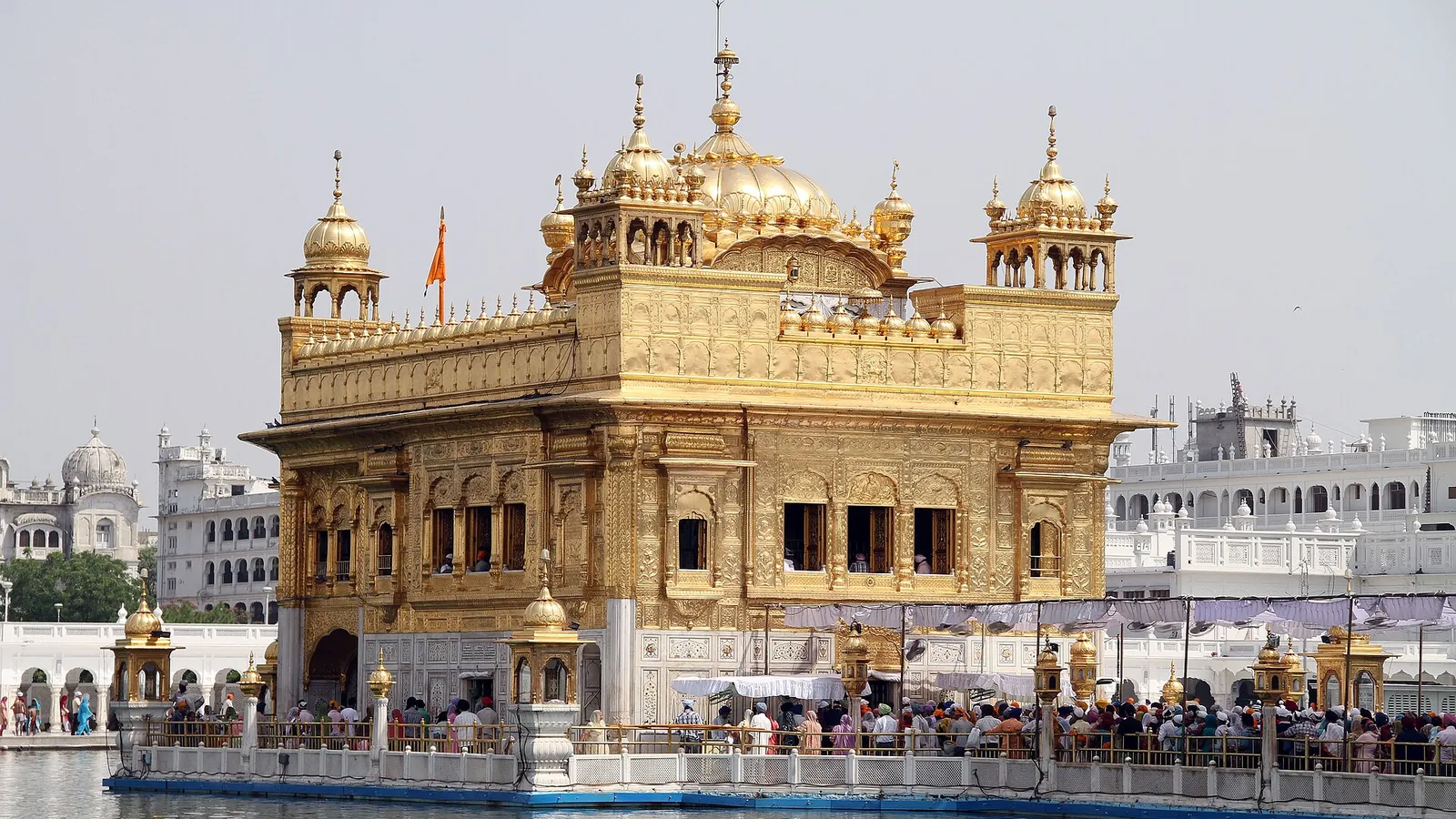The gold-covered Harmandir Sahib temple reflected in the sacred pool at Amritsar