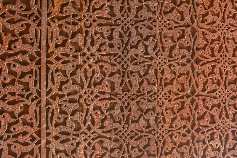 Carved stonework on a wall in the Qutb Minar complex