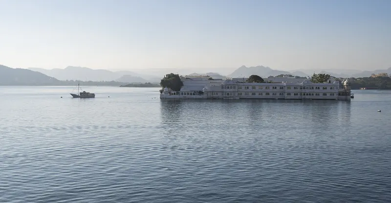 The white Lake Palace hotel on an island in Lake Pichola seen from the City Palace