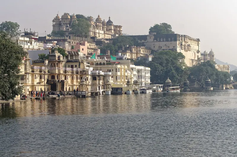 The City Palace of Udaipur rising above the waters of Lake Pichola
