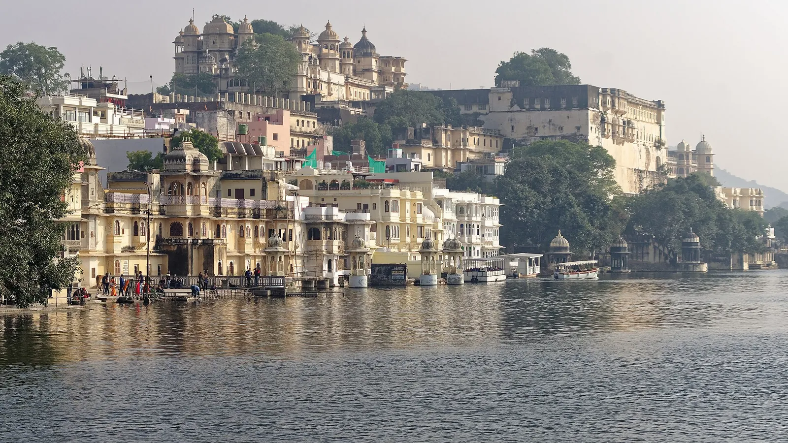 The City Palace of Udaipur rising above the waters of Lake Pichola