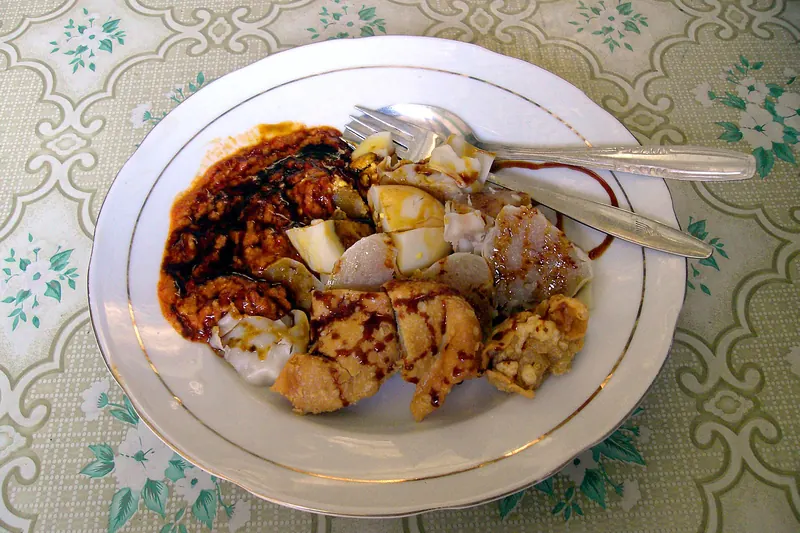Siomay, steamed fish dumplings served with peanut sauce