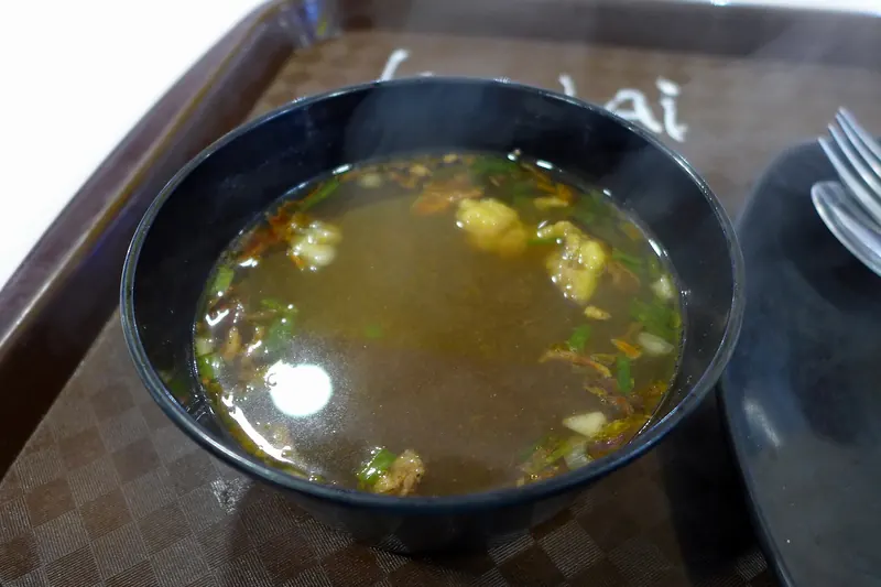 A bowl of rawon, East Java's dark beef soup