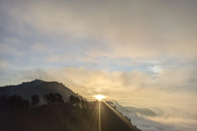 The sky turning orange over the Bromo caldera at sunrise