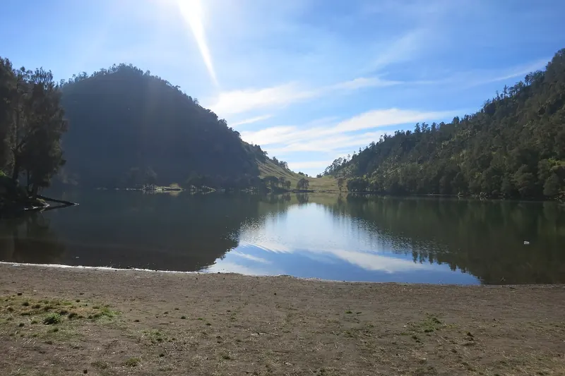 Trekkers at the highland lake of Ranu Kumbolo