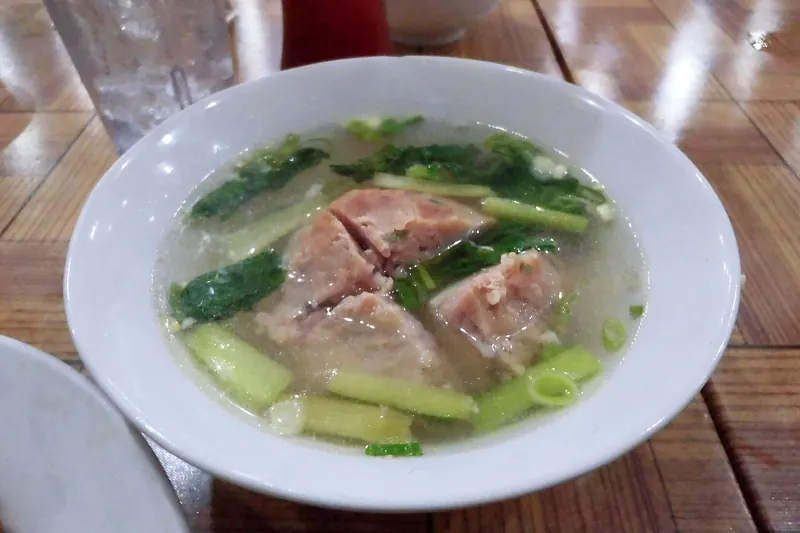 A bowl of bakmi, Chinese-Indonesian noodles, with meatballs