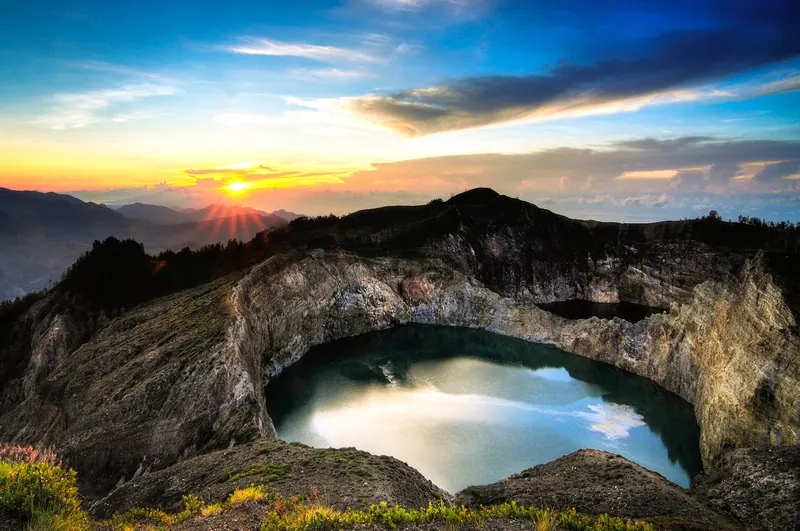 The three coloured crater lakes of Kelimutu volcano in Flores