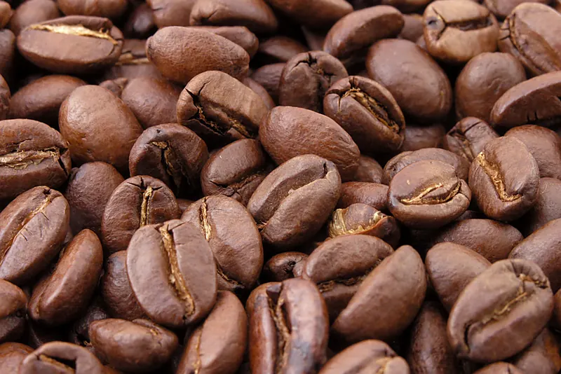 Roasted coffee beans, grown across Flores' volcanic highlands