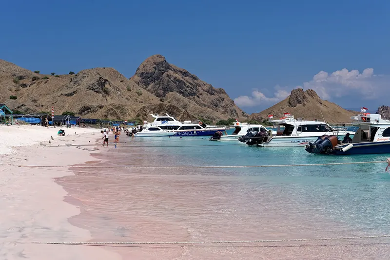 The rose-tinted sand and clear water of Pink Beach