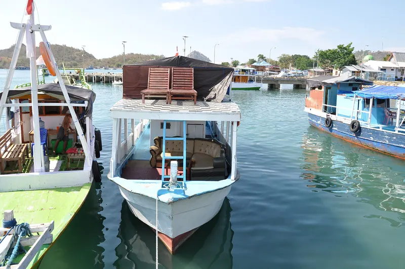 A traditional wooden liveaboard boat used for island-hopping in Komodo