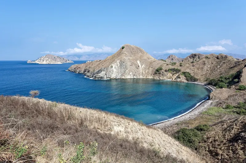The dramatic multi-bay silhouette of Padar Island in Komodo National Park