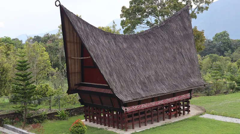 Rumah Bolon, a traditional Batak house with a distinctive curved roof