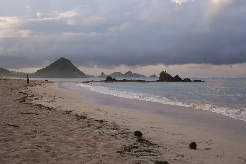 Surfers at a beach near Kuta, Lombok